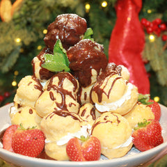 Alexanders Profiteroles with Belgian Chocolate Brandy Sauce 